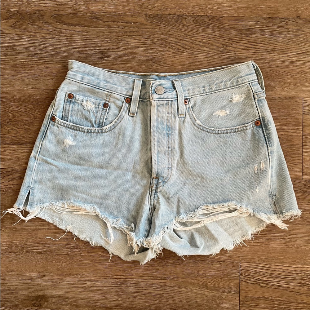 Light blue distressed Levi’s 501 shorts